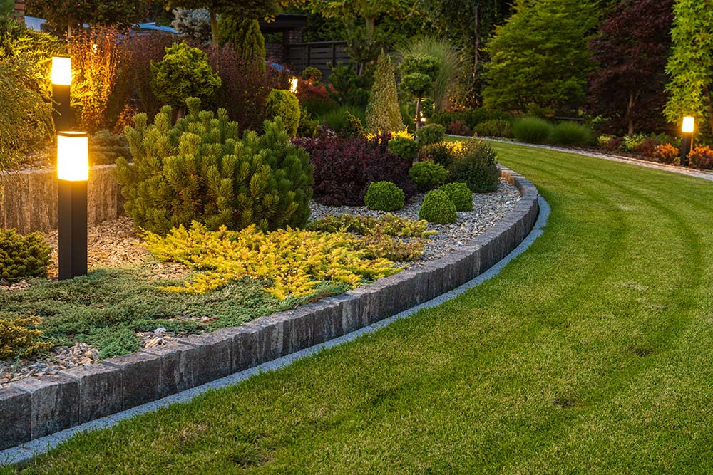 AdobeStock_572288141 Residential Garden hardscaping with lights